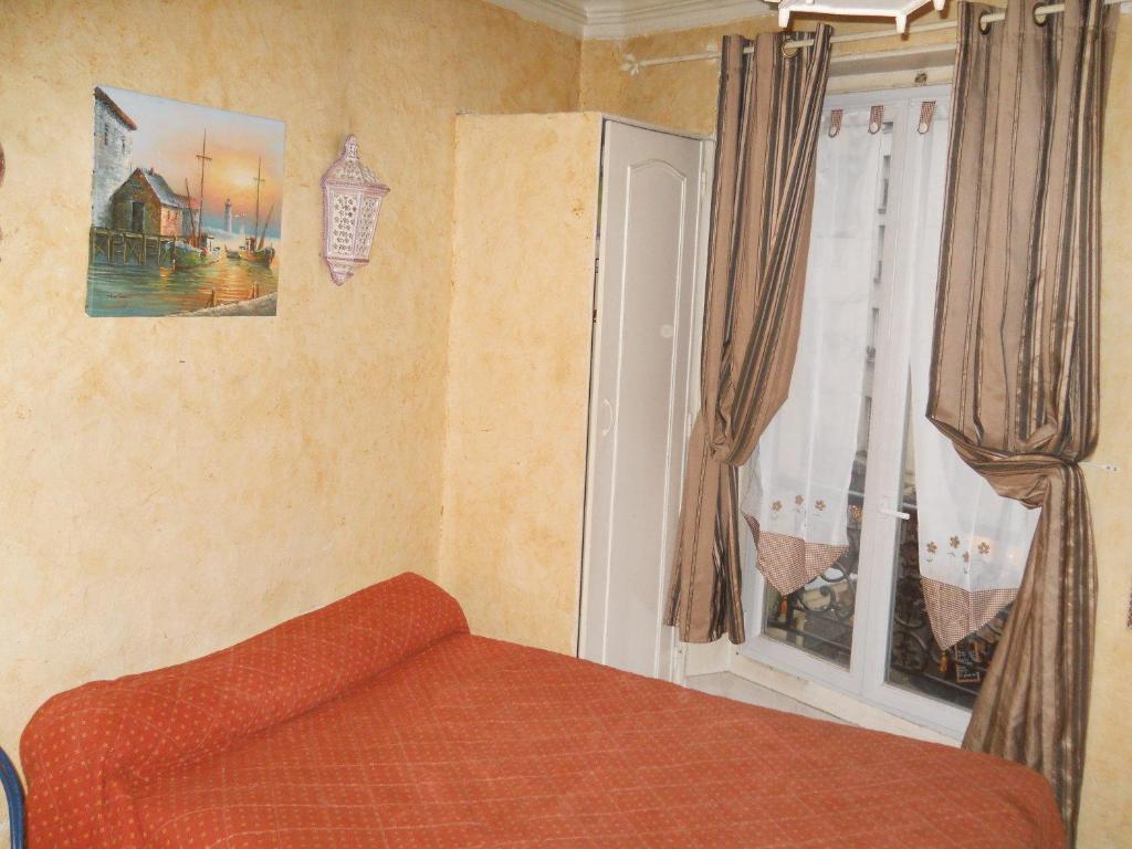 Hotel Le Petit Trianon Paris Rum bild